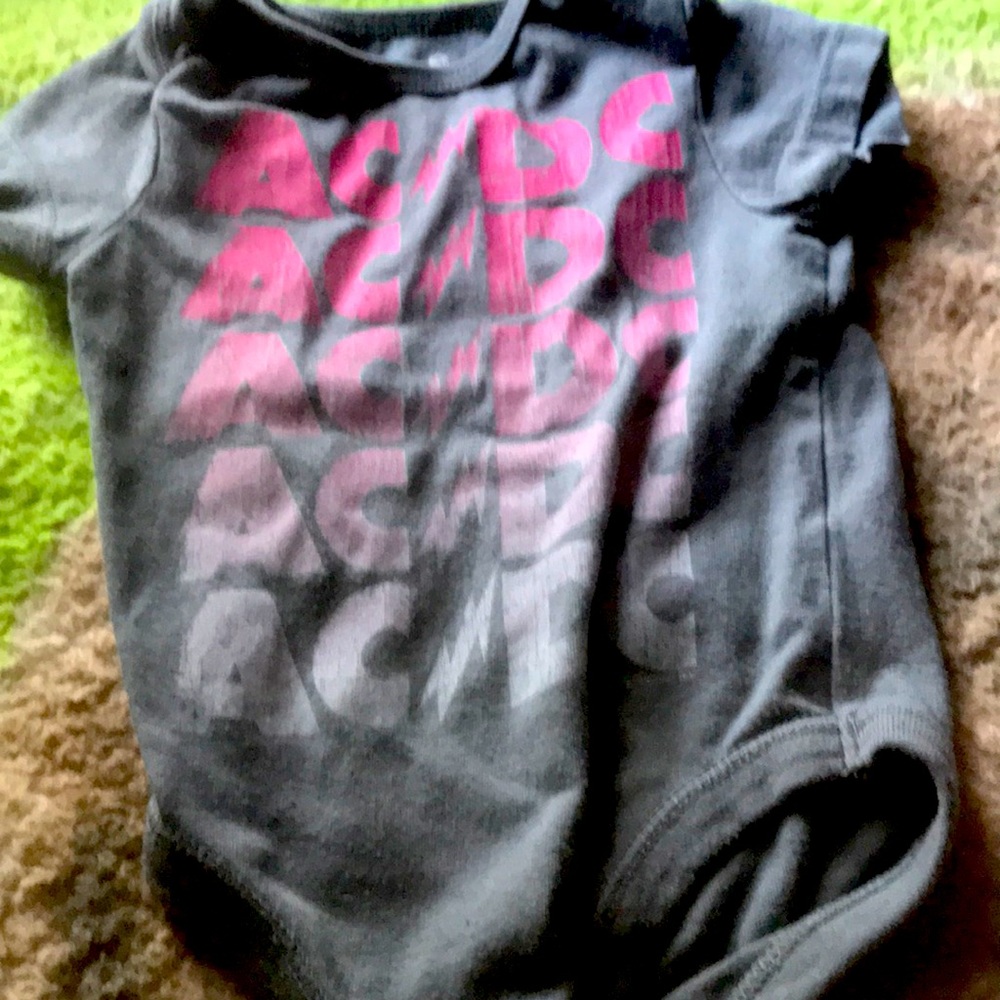 A gray and pink onesie